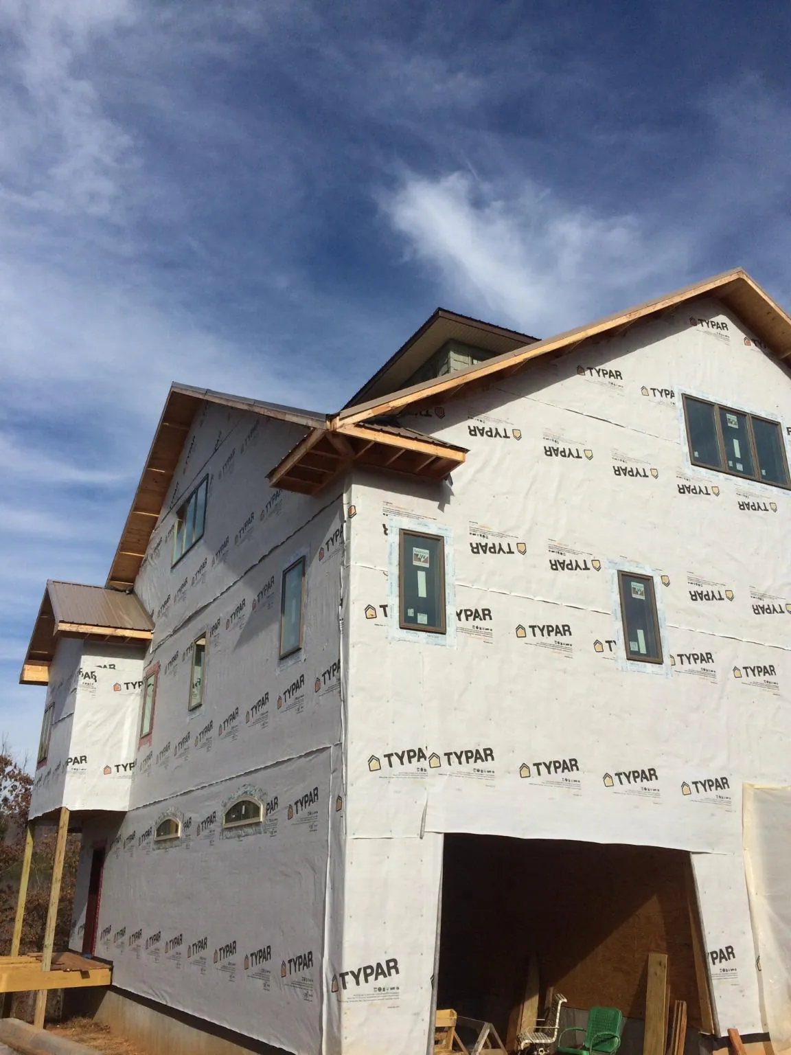 Stick built house wrapped in Typar with new roof framing and dormers in Tiplersville